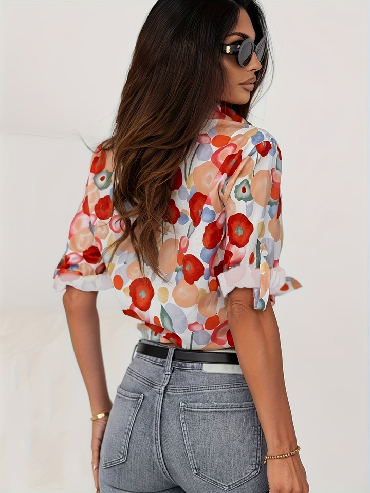 Casual & elegant women's Poppy Bold Floral printed button-down shirt. Long sleeve blouse for versatile styling.