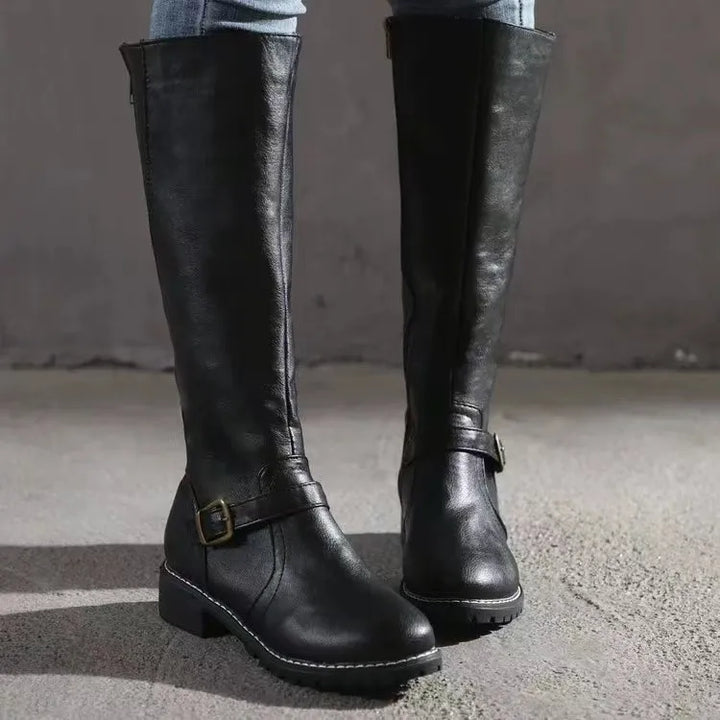 Durable women's orthopedic leather boots in a neutral color, showcasing excellent craftsmanship