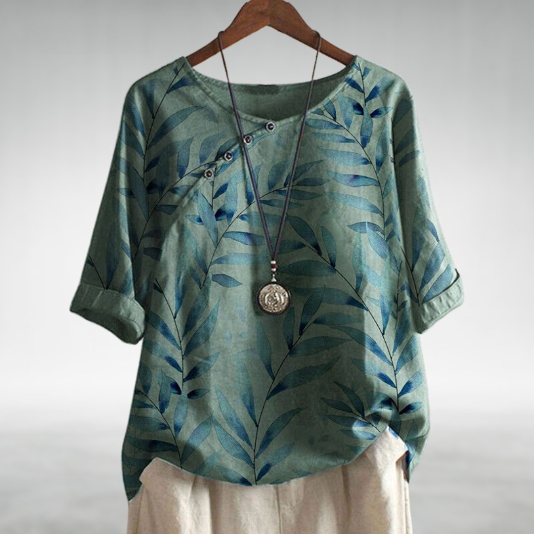 Women's printed asymmetric button blouse for casual chic everyday fashion.