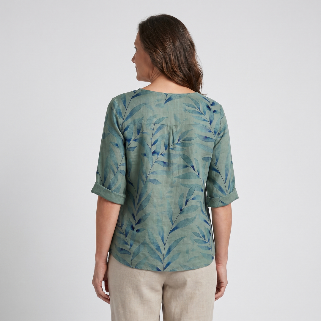 Casual chic women's printed top, perfect for elegant everyday wear with asymmetric buttons.