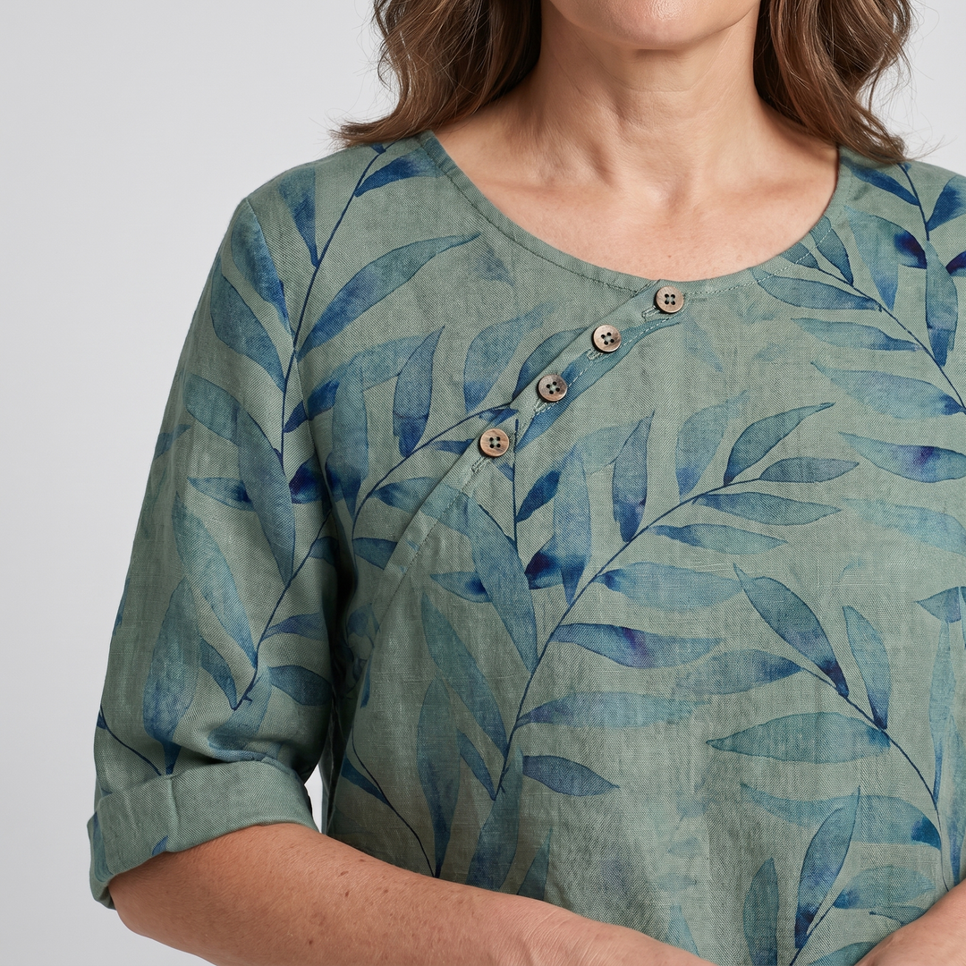 Plus size women's printed asymmetric button blouse, stylish & comfortable for everyday fashion.