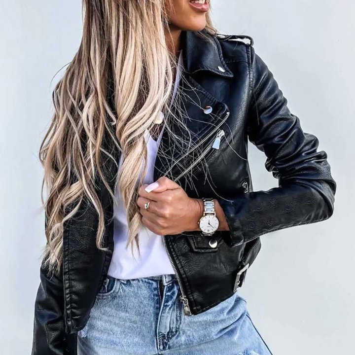 Women's red faux leather biker jacket with prominent zip-up front, perfect for a trendy casual look.