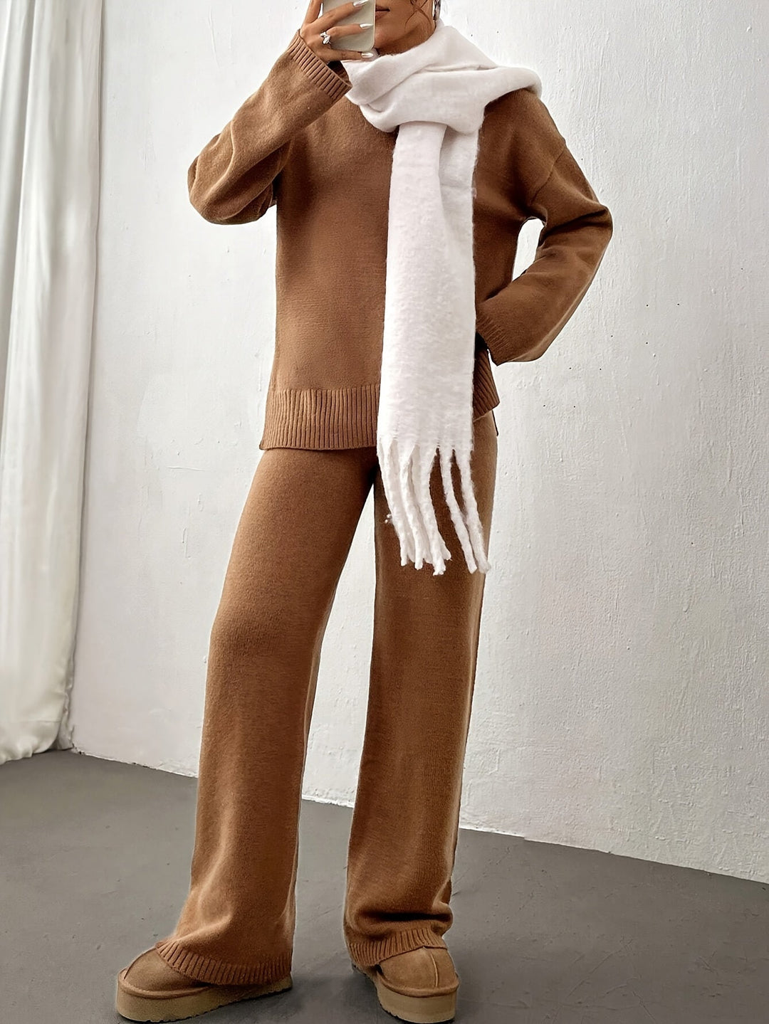 Detail of relaxed fit top from women's spring two-piece set in beige