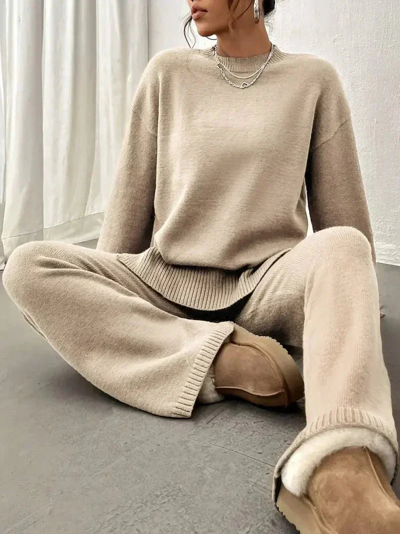 Close-up of fabric on women's beige relaxed fit two-piece spring outfit