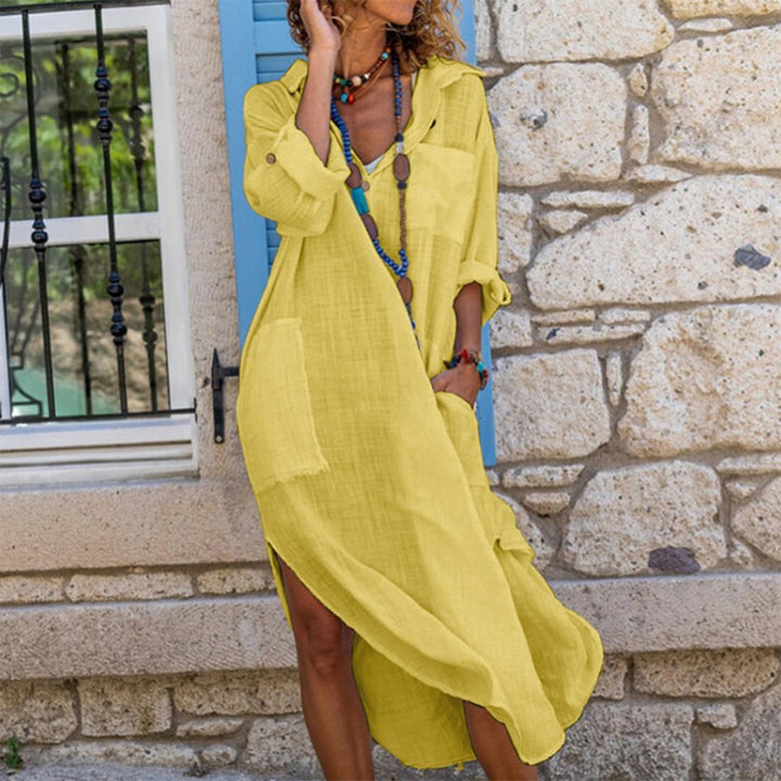 Versatile women's oversized shirt dress with button-front & relaxed fit. Ideal for casual, travel chic style.
