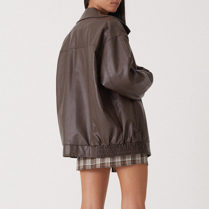 Oversized womens jacket with a relaxed fit, featuring a stylish zip-up front and collar