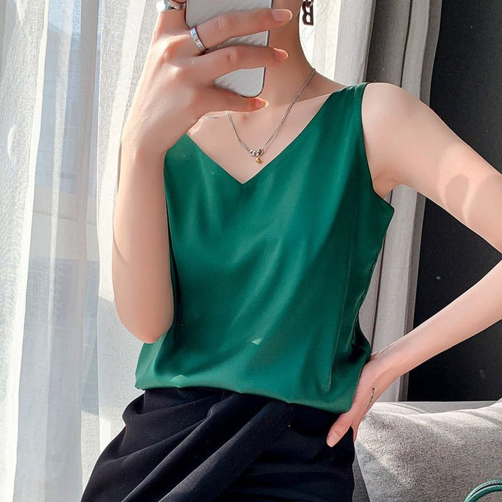 Sleeveless V-neck satin tank top for women, relaxed fit, perfect for casual or dressed-up occasions.