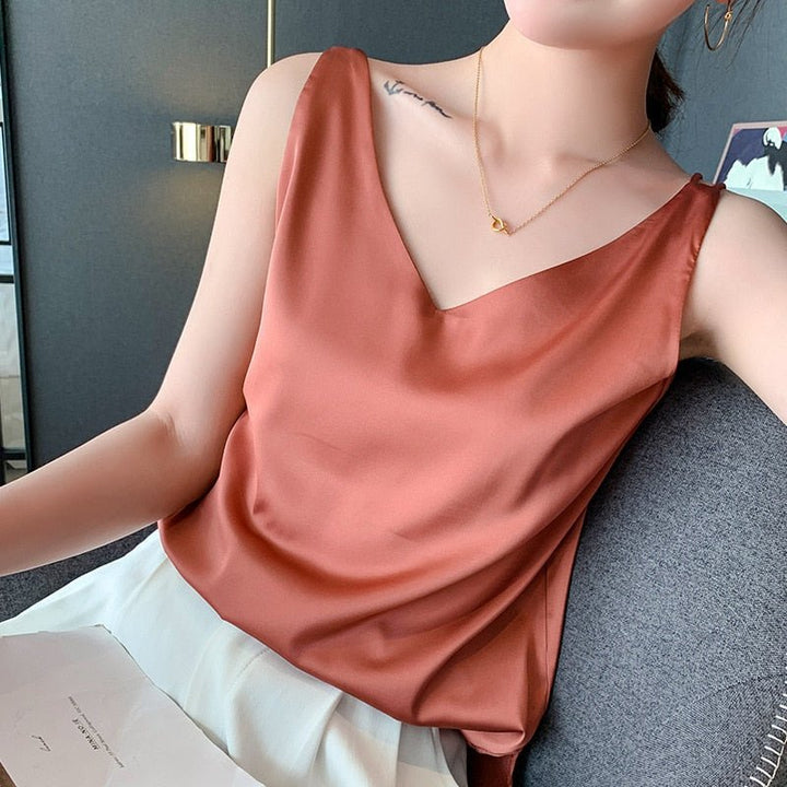 Elegant women's relaxed fit V-neck satin tank top, suitable for both day and evening wear.