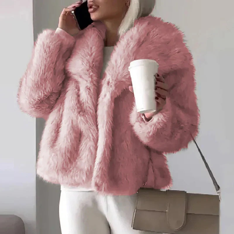Women's relaxed fit faux fur jacket in elegant cream color, perfect for winter fashion & cozy outerwear.