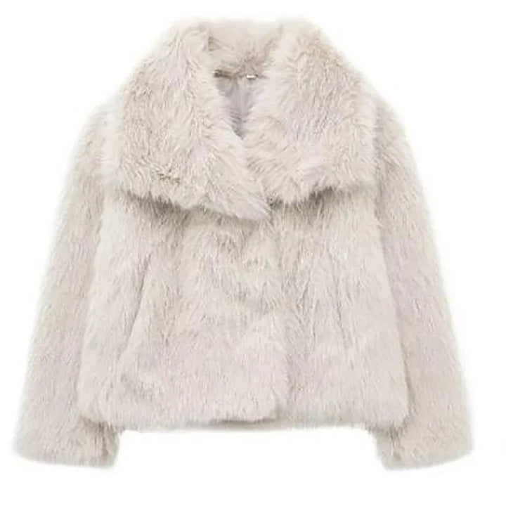 Women's relaxed fit faux fur jacket in classic black, a versatile and cozy piece of winter outerwear.