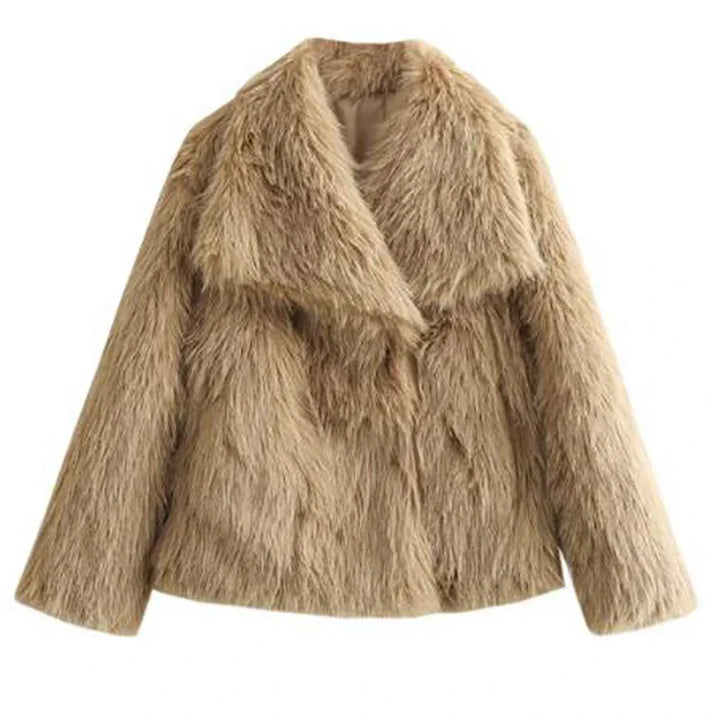 Stylish women's relaxed fit faux fur jacket draped over a chair, ready for cozy winter fashion.