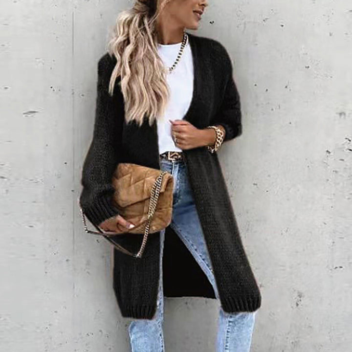 Soft knit women's relaxed fit long open front cardigan, ideal for everyday casual wear.