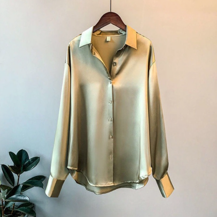 Women's relaxed fit long sleeve satin button-down blouse in a sophisticated, elegant style.