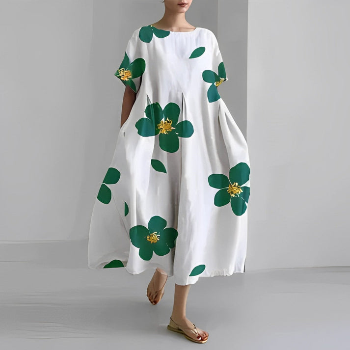 Women's relaxed fit midi dress with vibrant floral print, perfect for summer casual wear.