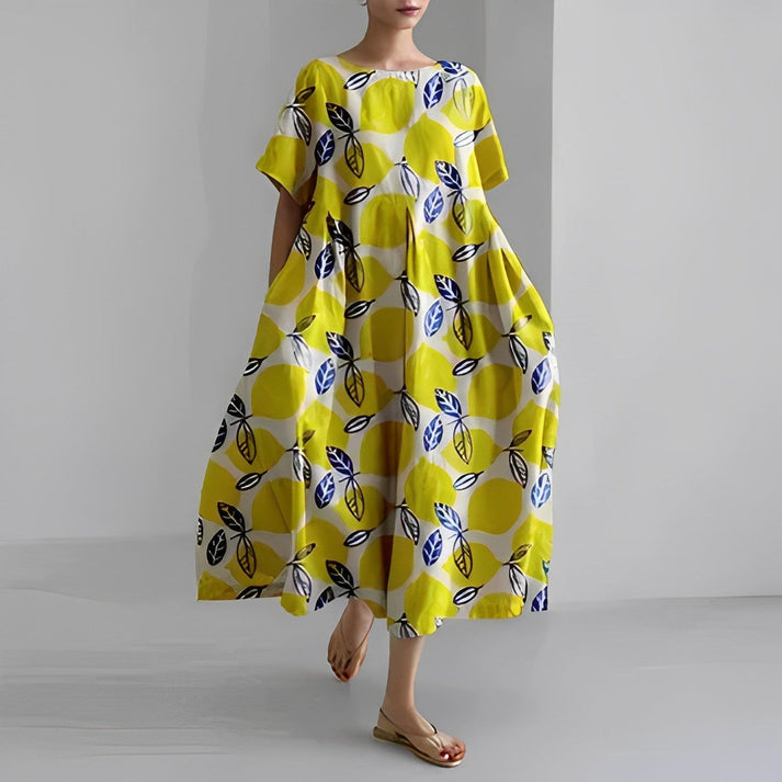 Casual women's midi dress in a vibrant floral print with a comfortable, relaxed silhouette.
