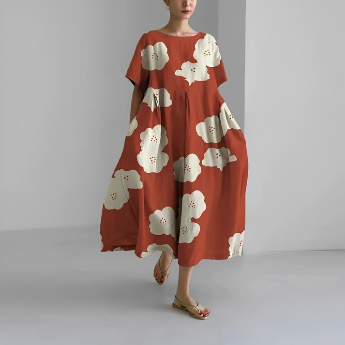 Stylish women's summer dress: a relaxed floral print midi, versatile for casual or party wear.