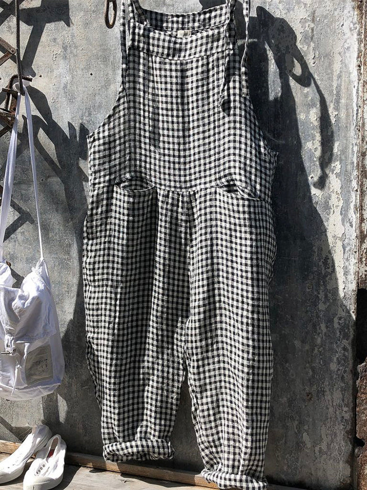 Women's relaxed fit cargo overall jumpsuit with practical pockets, ideal summer casual fashion.