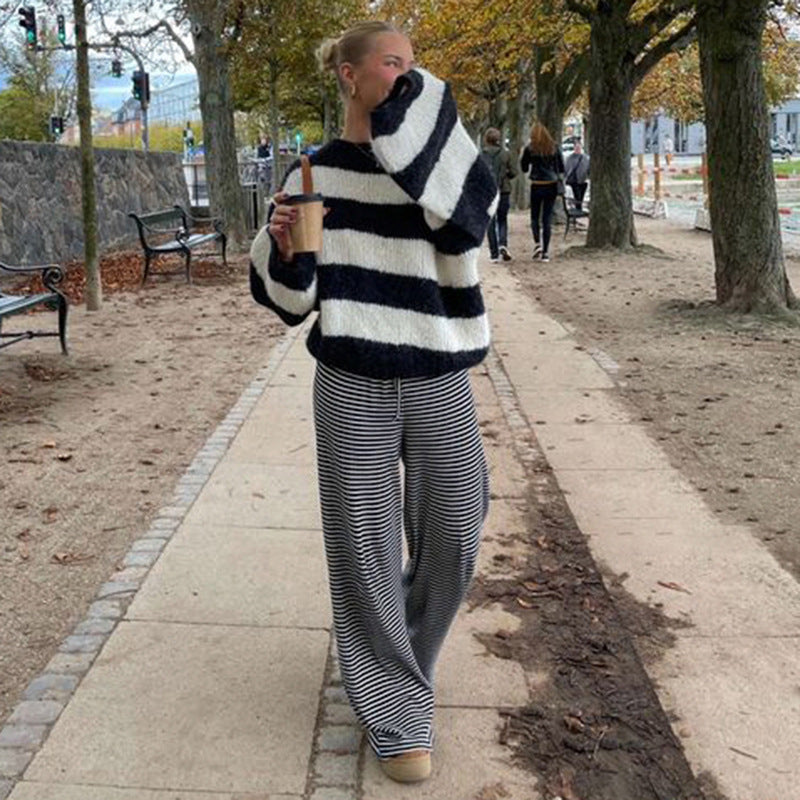 Relaxed fit women's pants featuring a stylish striped pattern, suitable for spring.