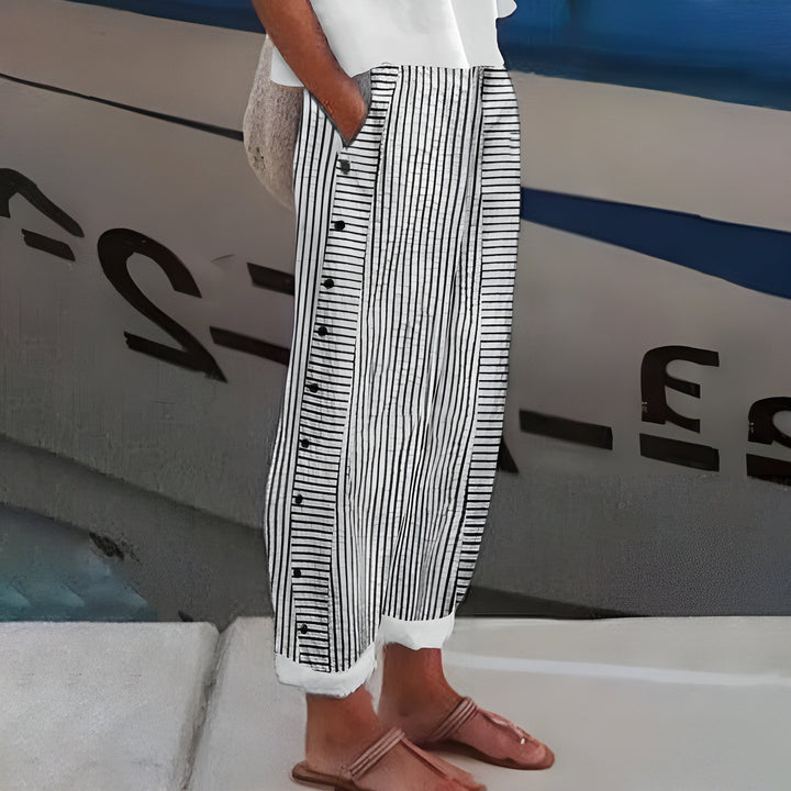 Lightweight women's summer trousers with elastic waist, ideal for vacation style & warm weather comfort. Easy care.