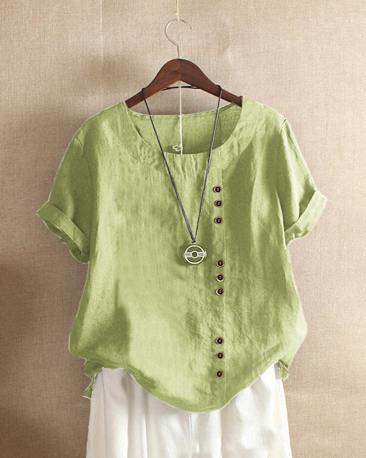 Women's comfortable relaxed fit tunic blouse, a chic short sleeve summer top.