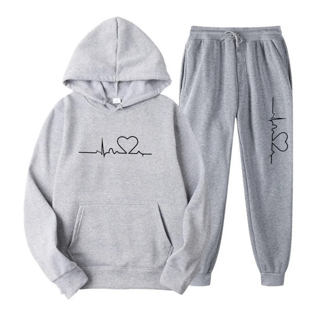 Women's relaxed fit two-piece lounge set, comfortable hoodie and jogger pants.
