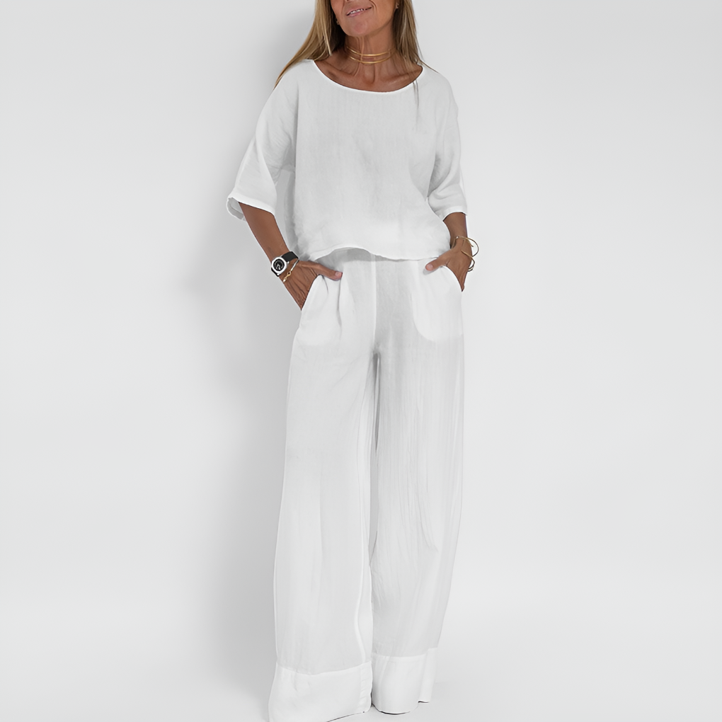 Comfy women's athleisure two-piece set. Relaxed fit top & wide leg pants, perfect for lounging or summer outfits.