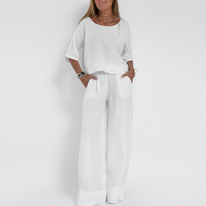 Comfy women's athleisure two-piece set. Relaxed fit top & wide leg pants, perfect for lounging or summer outfits.