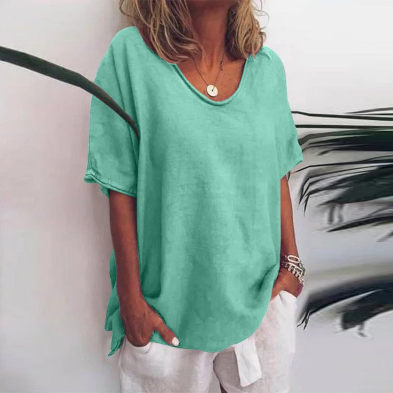 Summer women's elbow-sleeve V-neck shirt. Relaxed fit blouse offering versatile style and everyday comfort for ladies.