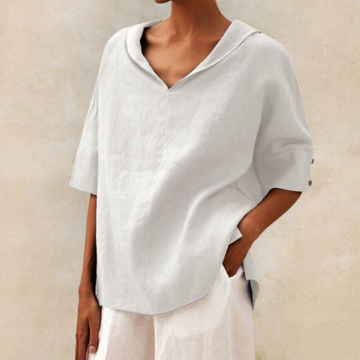Comfortable women's relaxed fit V-neck top in gray, a versatile piece for daily wear