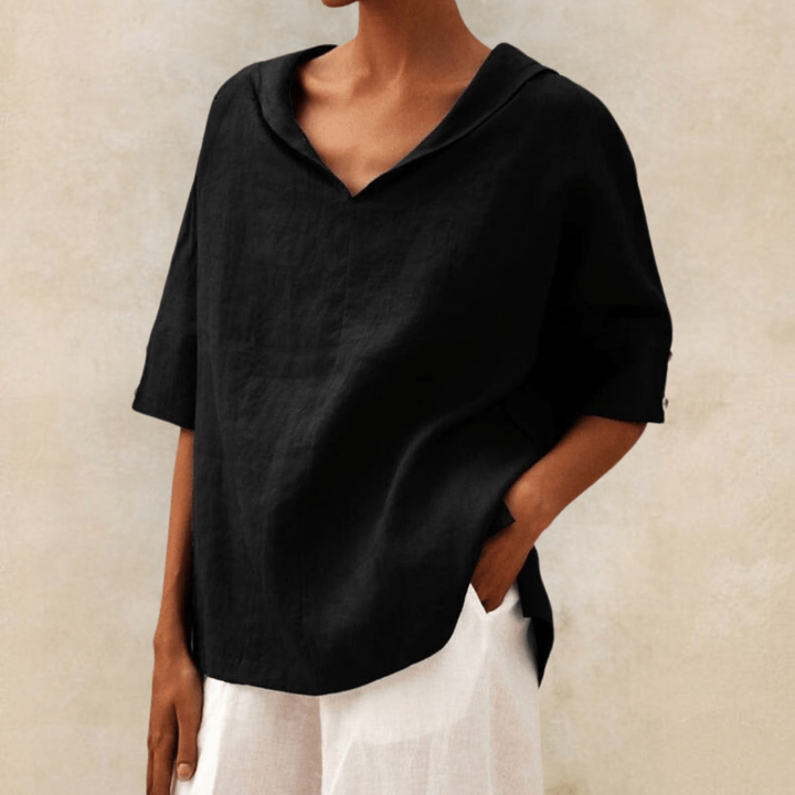 Spring/summer women's relaxed fit V-neck tunic blouse. Comfortable & stylish oversized short sleeve top.