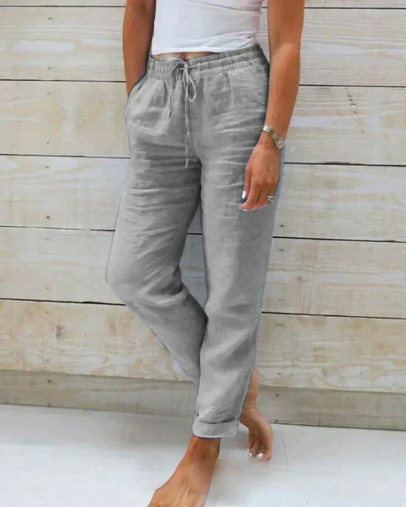 Women's relaxed fit wide-leg summer pants in sage green for comfortable casual warm-weather style.