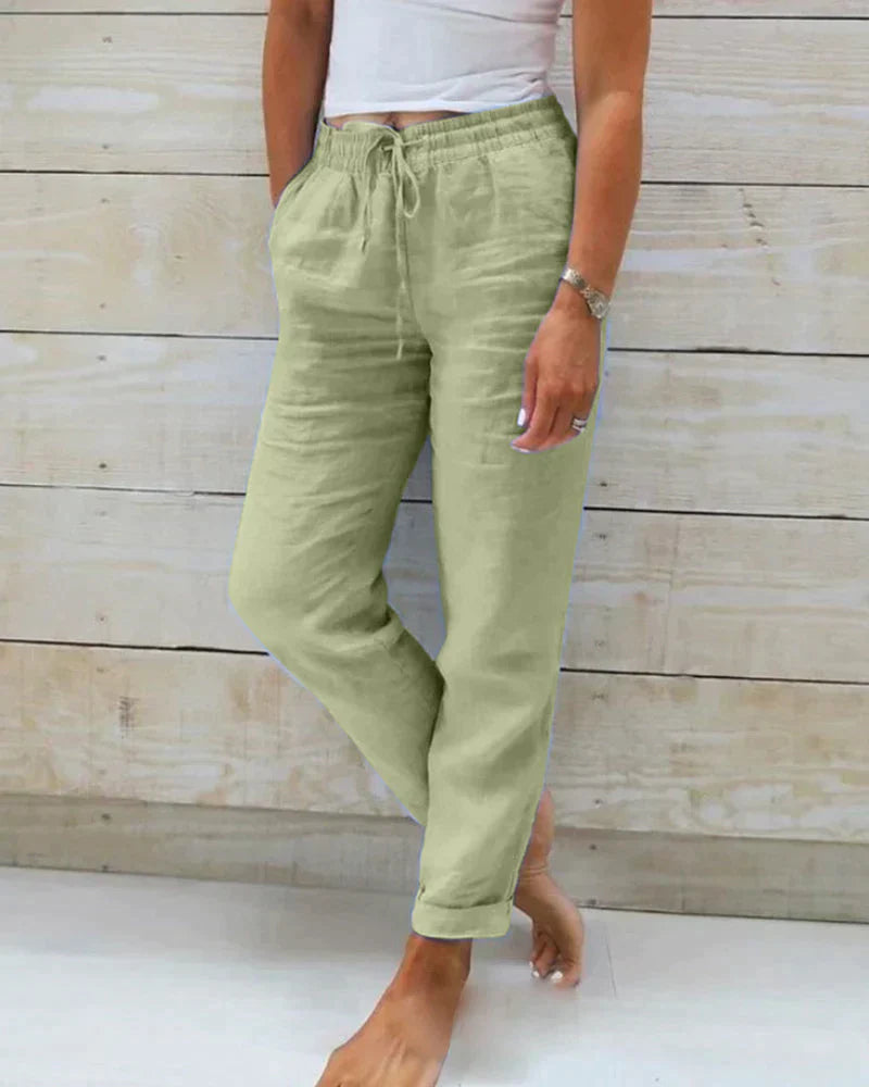 Stylish gray wide-leg women's summer pants with a relaxed fit, perfect for comfortable warm weather fashion.