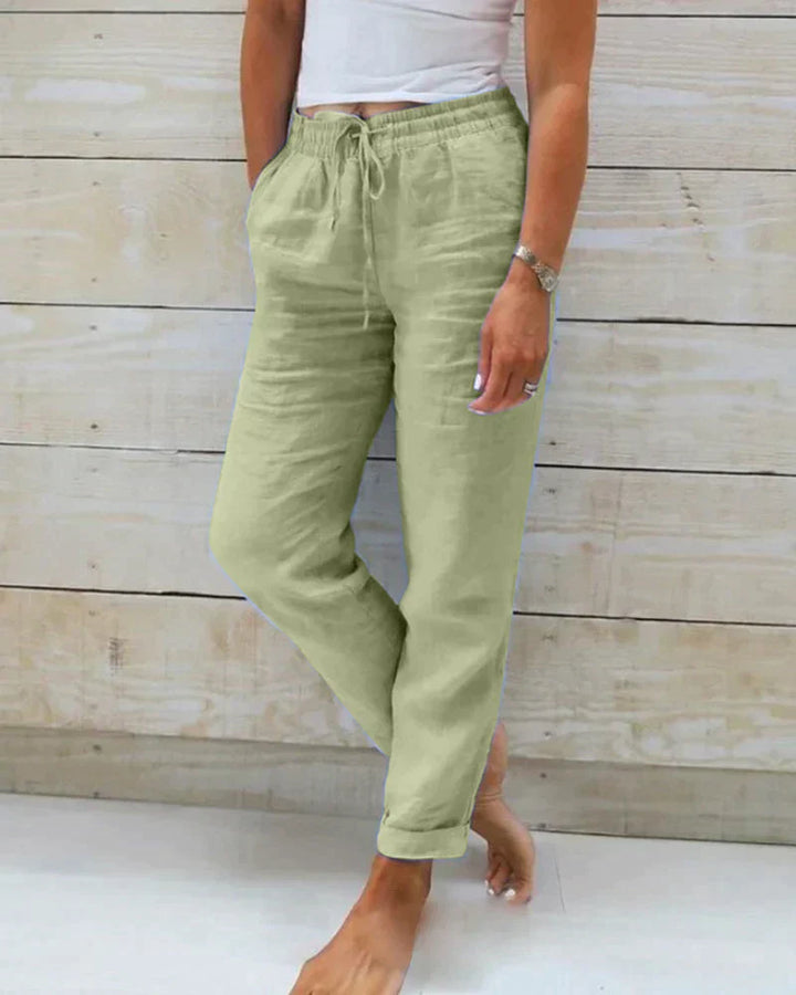 Stylish gray wide-leg women's summer pants with a relaxed fit, perfect for comfortable warm weather fashion.