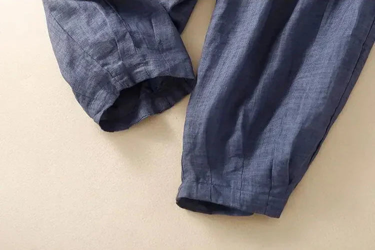 Women's linen trousers with a relaxed tapered leg, offering breathable comfort and a chic casual look.