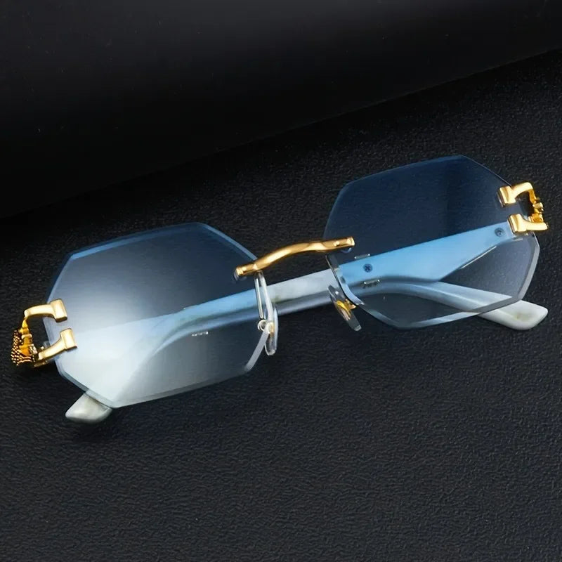 Luxury women's fashion sunglasses. Rimless geometric style with distinctive gold panther detail for a chic look.