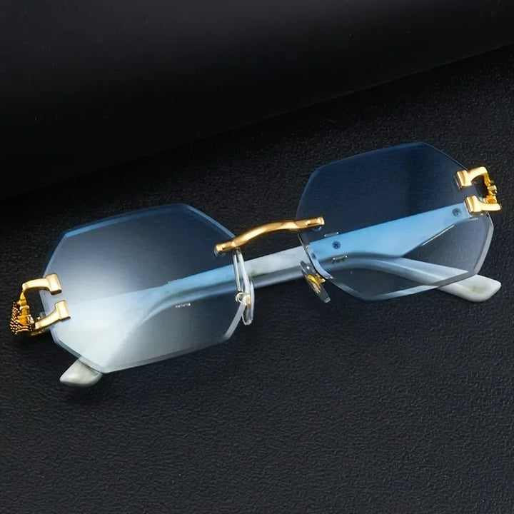 Luxury women's fashion sunglasses. Rimless geometric style with distinctive gold panther detail for a chic look.