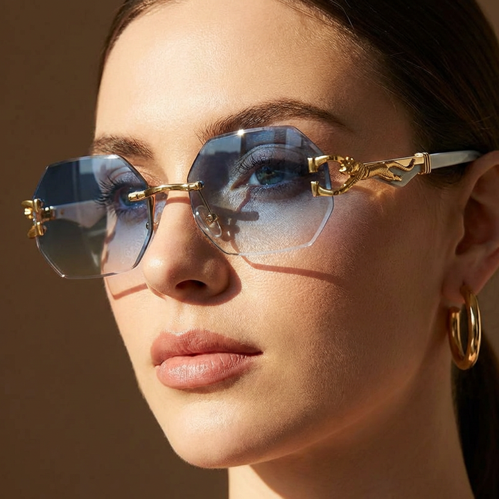 Chic women's geometric rimless sunglasses. Luxury eyewear with UV protection and a unique sculptural design.