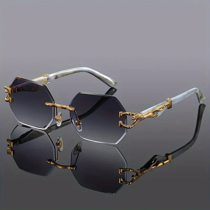 Modern women's geometric rimless sunglasses. Elegant gold panther detail for a sophisticated fashion statement.