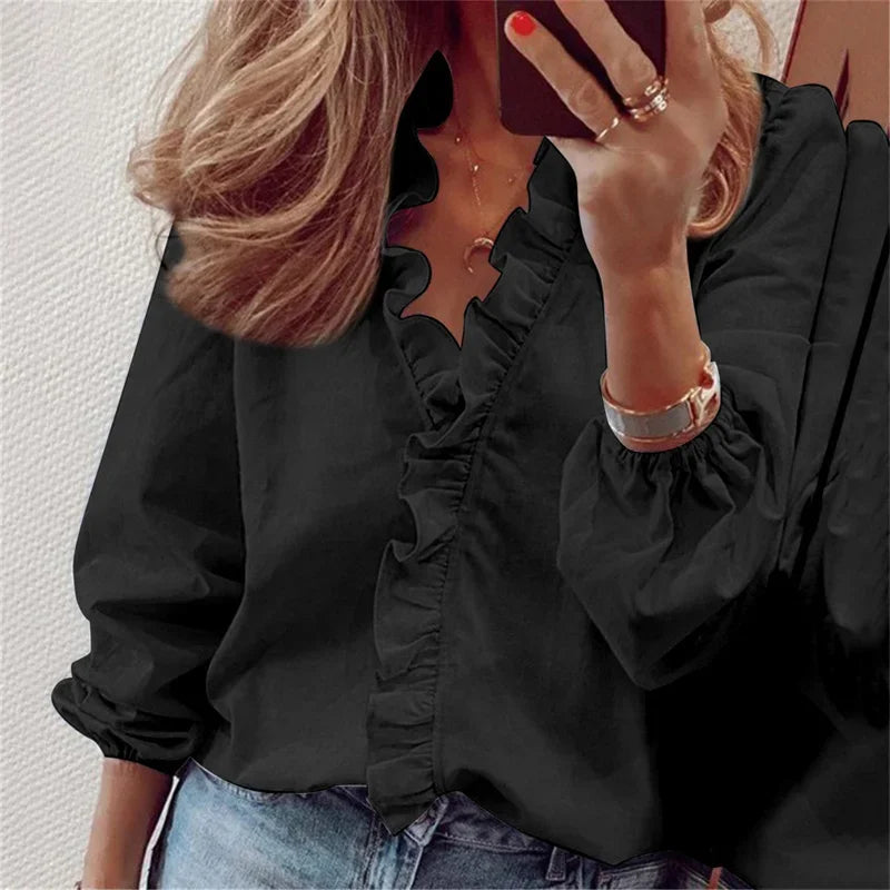 Elegant women's V-neck blouse with ruffle trim, a stylish long sleeve top for versatile everyday fashion.