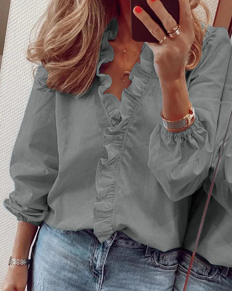 Ladies fashion V-neck ruffle blouse, long sleeve top for women. Perfect for elegant spring & fall outfits.