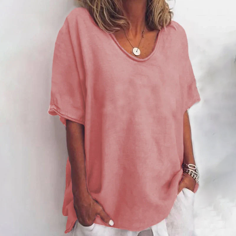 Women's scoop neck loose fit blouse, short sleeve for casual everyday comfort.