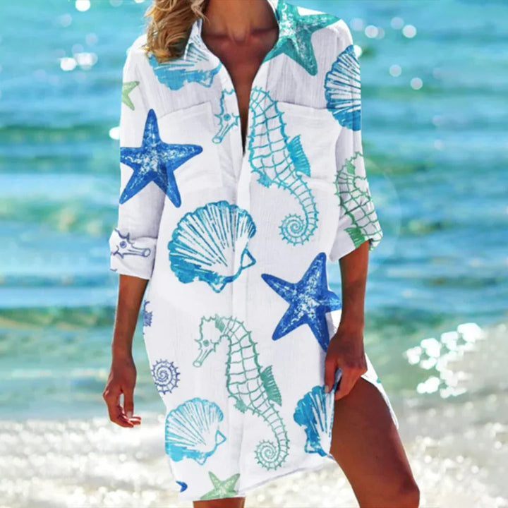 Women's button-down 3/4 sleeve beach cover up shirt dress, featuring a lovely seashell print.