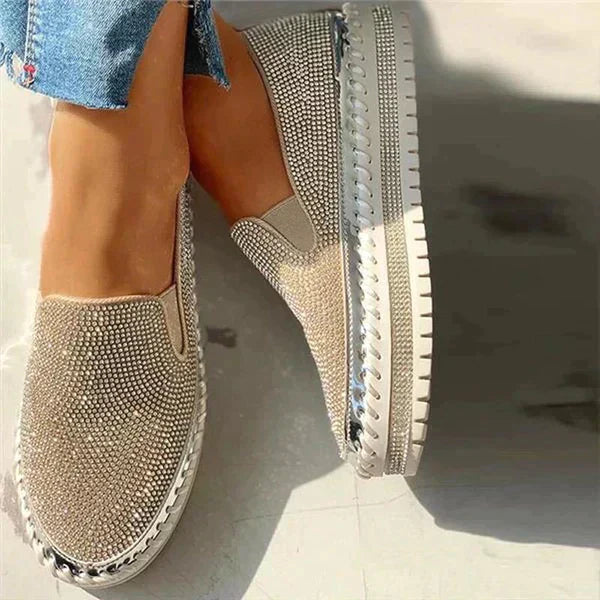 Glamorous women's shimmering slip-on flats, ideal for parties or a chic summer style. Sparkling embellished footwear.