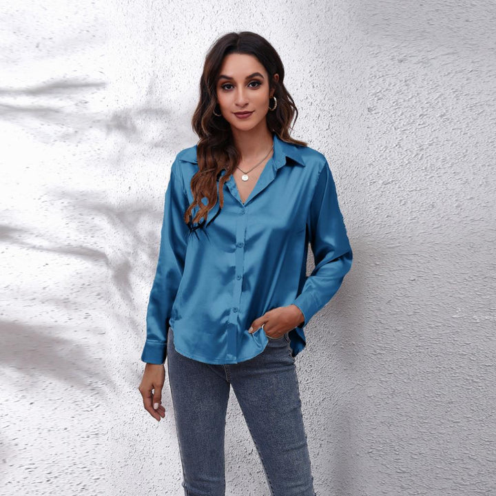 Women's silky satin button-down blouse, perfect for elegant workwear or chic casual outfits.