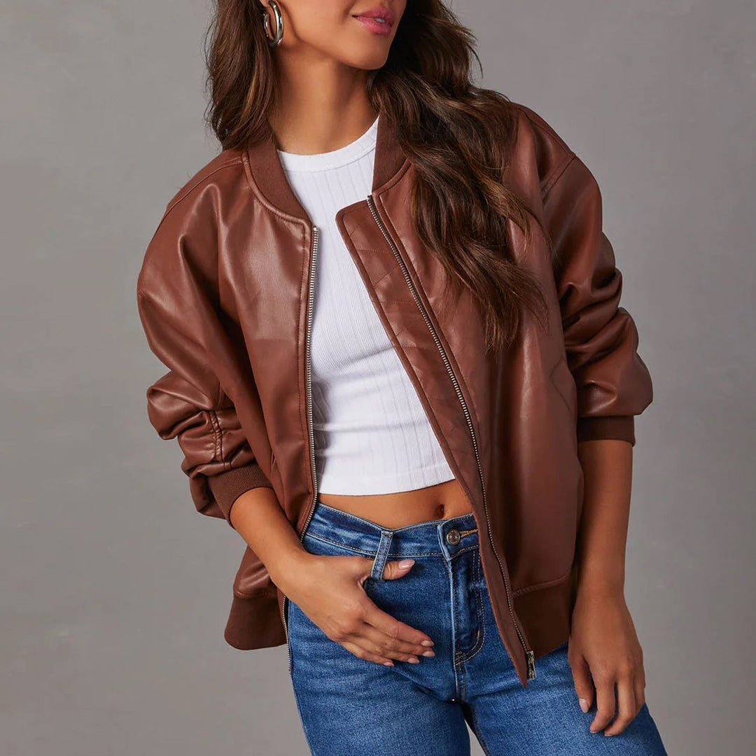 Modern women's sleek bomber jacket in a stylish cut, great for versatile layering and everyday wear.