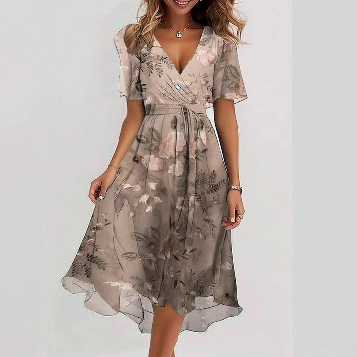 Lightweight & breathable women's sleeveless summer dress. Flowy midi style, perfect for warm weather and vacation.