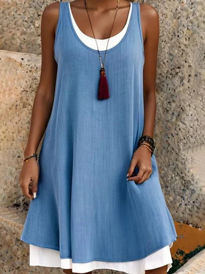 Comfortable women's two-layer A-line dress, sleeveless with a scoop neck, ideal for versatile everyday wear.