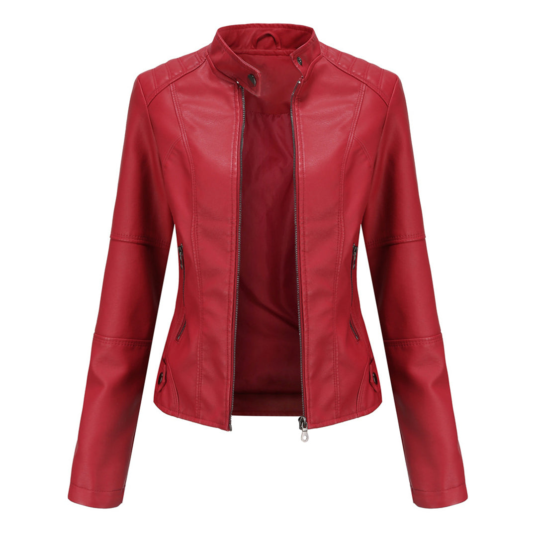 Chic women's motorcycle jacket, slim-fit faux leather with silver hardware, versatile outerwear.