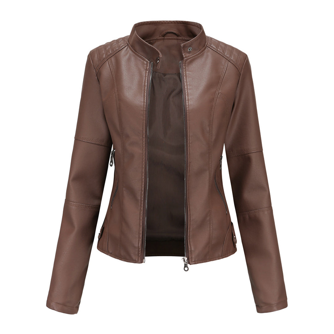 Close-up of a women's faux leather slim-fit biker jacket, showcasing texture and zipper details.