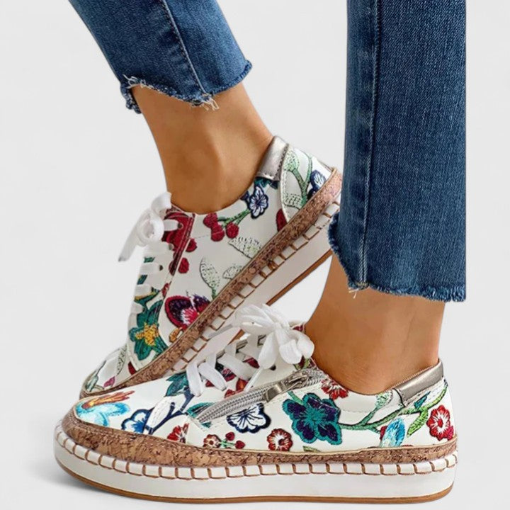 Pair of women's comfort slip-on shoes, designed for all-day foot support and walking.